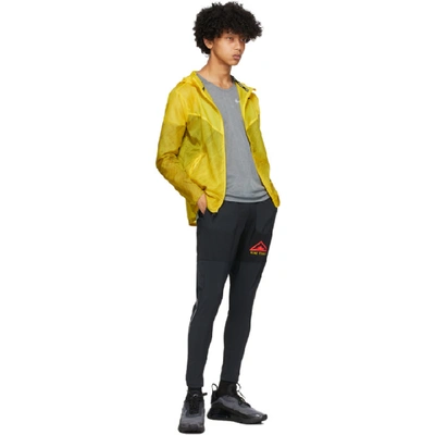 Shop Nike Yellow & Black Trail Windrunner Jacket In 735 Speed Y