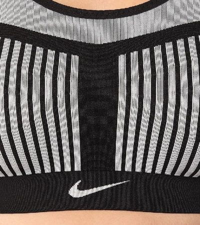 Shop Nike Flyknit Sports Bra In Black
