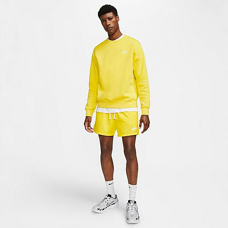 yellow nike woven shorts