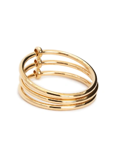 Shop Jw Anderson Triple Bangle Stack In Gold