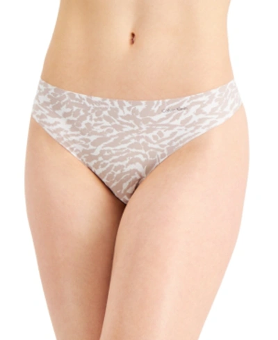 Shop Calvin Klein Women's Invisibles Thong Underwear D3428 In Brushing Leopard