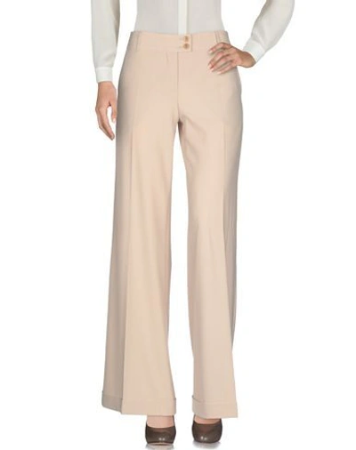 Shop Moschino Cheap And Chic Casual Pants In Beige