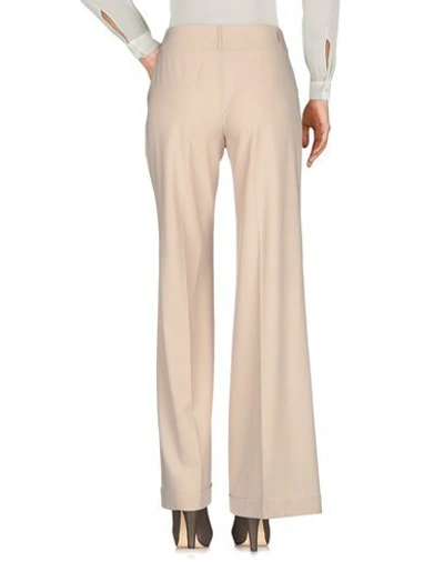 Shop Moschino Cheap And Chic Casual Pants In Beige