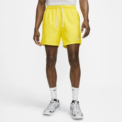Shop Nike Sportswear Men's Woven Shorts In Yellow