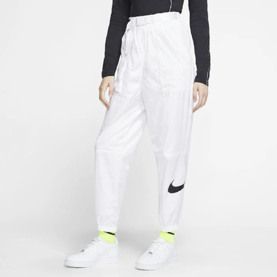 Shop Nike Sportswear Womenâs Woven Swoosh Pants (white) - Clearance Sale In White,black