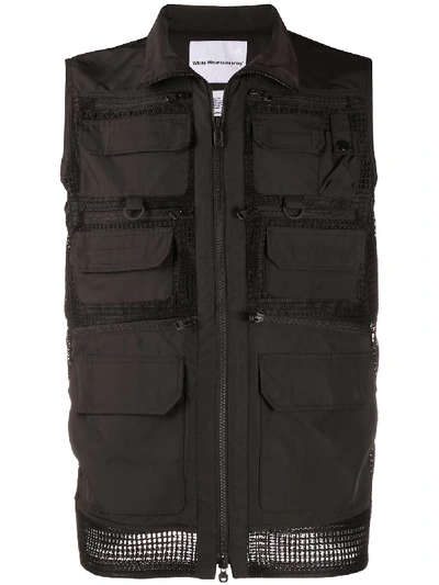 Shop White Mountaineering Multi-pocket Mesh Panel Sleeveless Jacket In Black