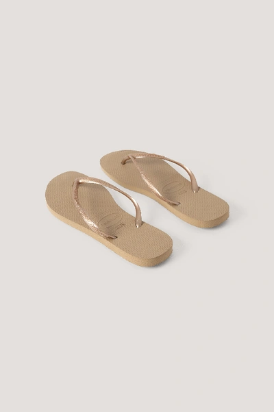 Havaianas Slim Logo-embossed Rubber Flip Flops In Rose Gold