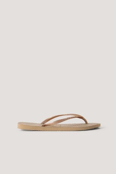 Havaianas Slim Logo-embossed Rubber Flip Flops In Rose Gold