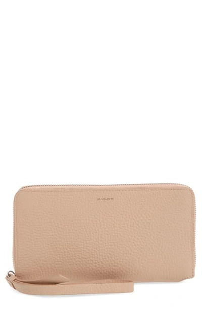 Shop Allsaints Fetch Leather Phone Wristlet In Nude Pink