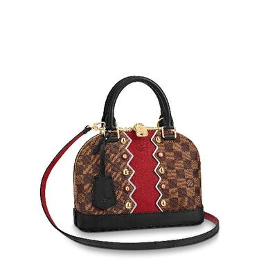louis vuitton purse with red lining
