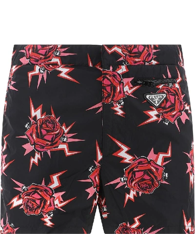 Shop Prada Floral Printed Swim Shorts In Black