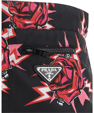 Shop Prada Floral Printed Swim Shorts In Black