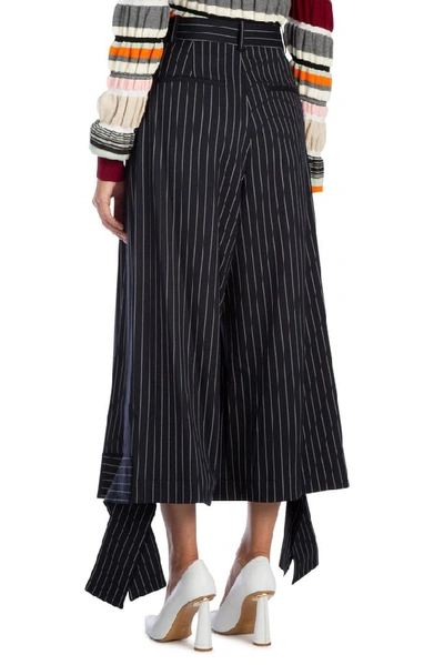 Shop Jw Anderson Pinstriped Pants In Multi