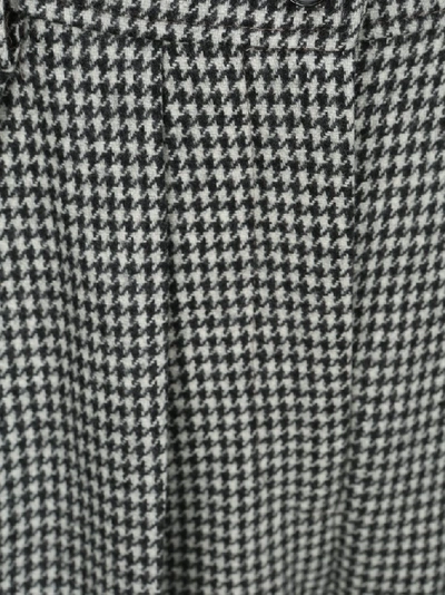 Shop Jw Anderson Houndstooth Tapered Trousers In Multi