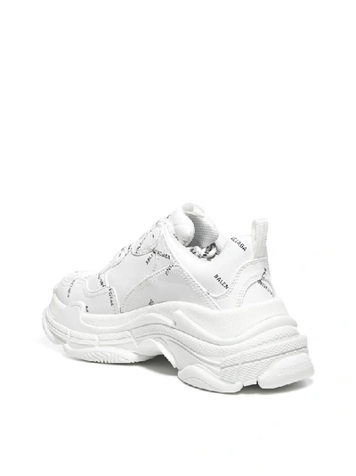 Shop Balenciaga Triple S Sneakers In White