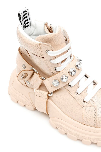 Shop Miu Miu Combat Crystal Embellished Sneakers In Pink