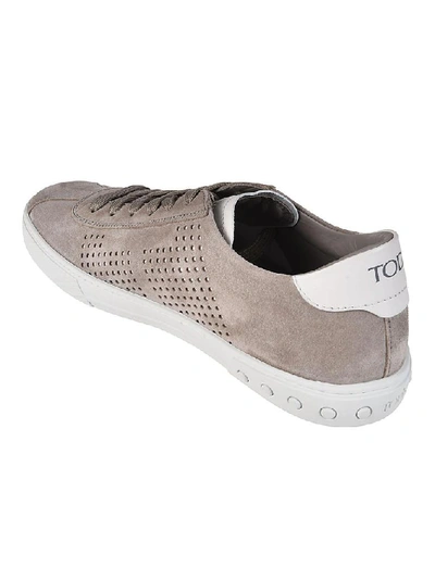 Shop Tod's Perforated Low Top Sneakers In Grey