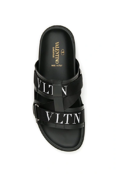 Shop Valentino Vltn Slides In Black