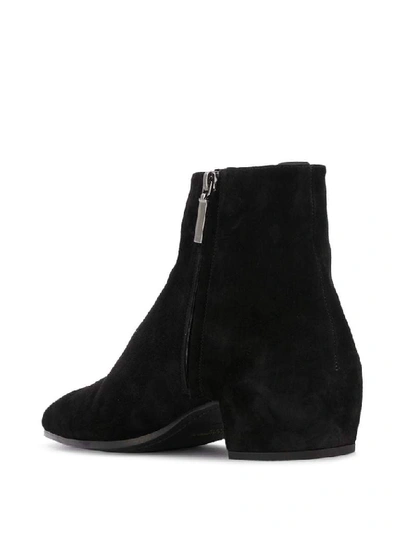 Shop Saint Laurent Zipped Ankle Boots In Black