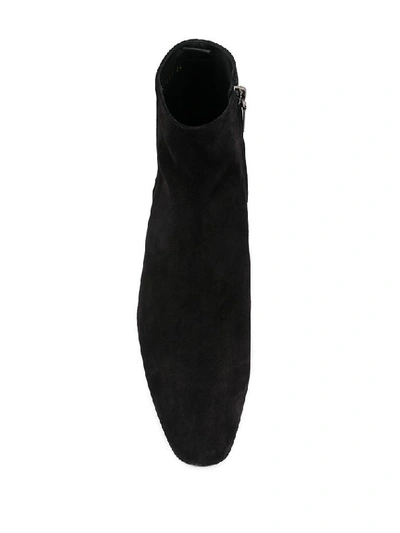 Shop Saint Laurent Zipped Ankle Boots In Black