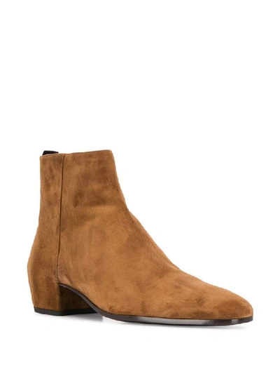 Shop Saint Laurent Zipped Ankle Boots In Brown