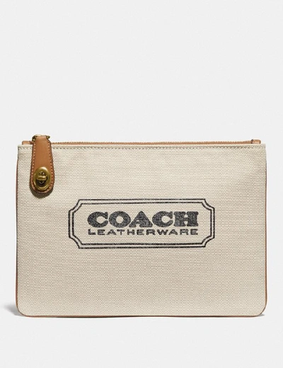 Shop Coach Turnlock Pouch 26 With Badge - Women's In Brass/canvas Light Saddle