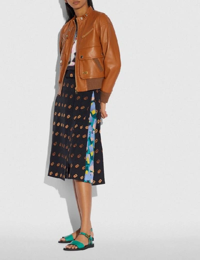 Shop Coach Print Wrap Skirt In Color<lsn_delimiter>black/orange