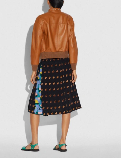 Shop Coach Print Wrap Skirt In Color<lsn_delimiter>black/orange