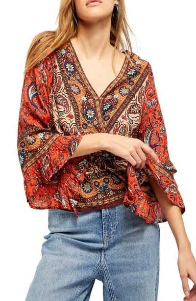 Shop Free People Rosalie Bell Sleeve Faux Wrap Top In Red Combo