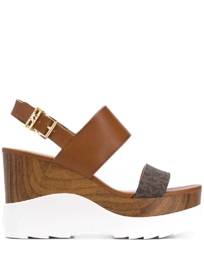 Shop Michael Michael Kors Rhett Logo Band Wedge Sandals In Brown