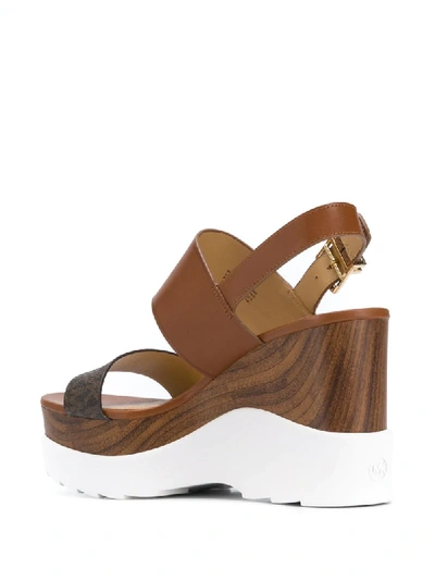 Shop Michael Michael Kors Rhett Logo Band Wedge Sandals In Brown