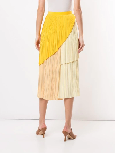 Shop Akira Naka Asymmetric Pleated Skirt In Yellow