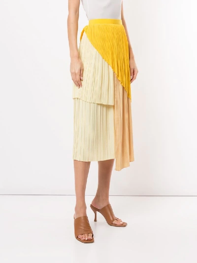 Shop Akira Naka Asymmetric Pleated Skirt In Yellow