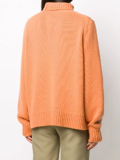 Shop The Row Cashmere Roll Neck Jumper In Orange