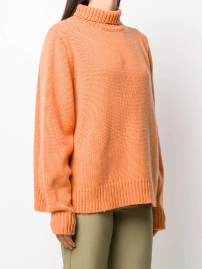 Shop The Row Cashmere Roll Neck Jumper In Orange