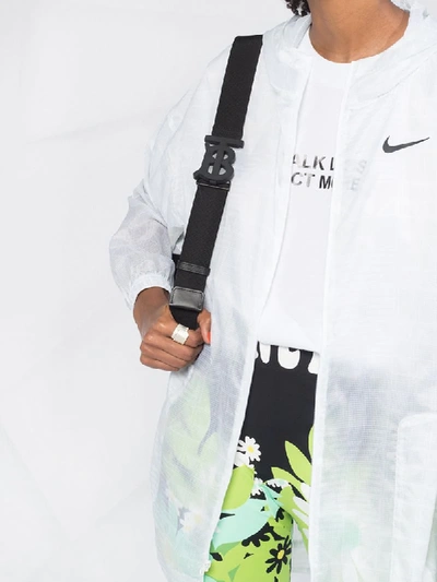 Shop Nike Transparent Rain Jacket In White