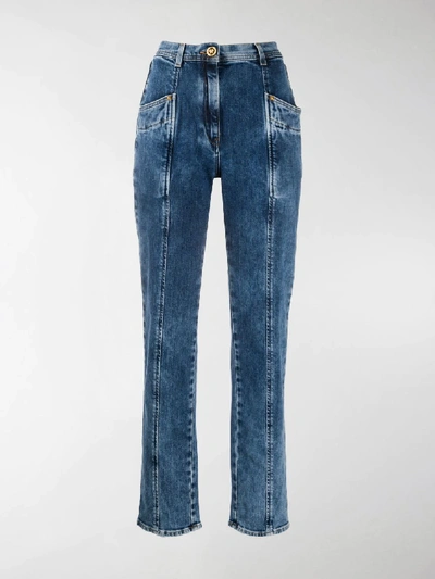 Shop Versace Panelled Tapered Leg Jeans In Blue