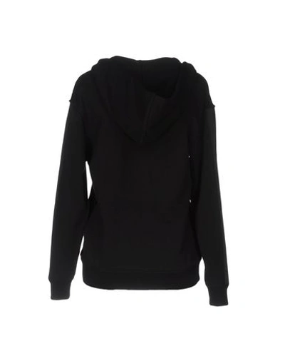 Shop The Editor Hooded Sweatshirt In Black