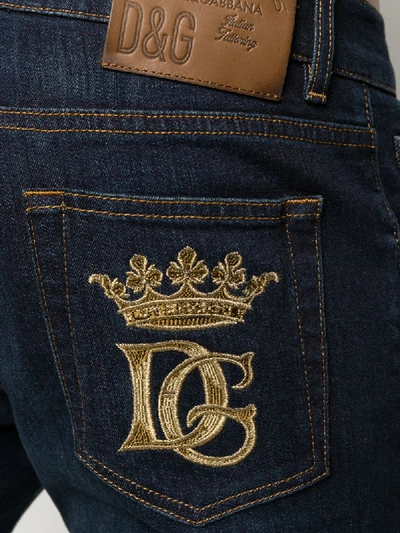 Shop Dolce & Gabbana Dg Crown-embroidered Slim-fit Jeans In Blue