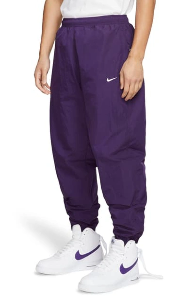 Shop Nike Lab Collection Nrg Nylon Track Pants In Grand Purple