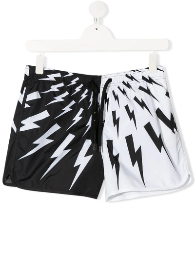 Shop Neil Barrett Teen Lightning Print Swim Shorts In White