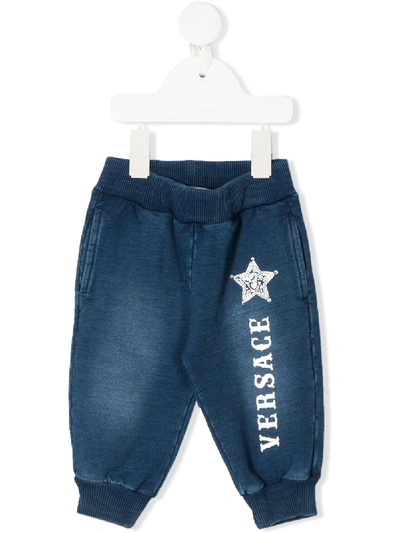 Shop Young Versace Logo Print Track Pants In Blue