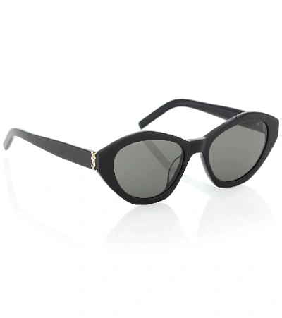 Shop Saint Laurent M60 Oval Sunglasses In Black