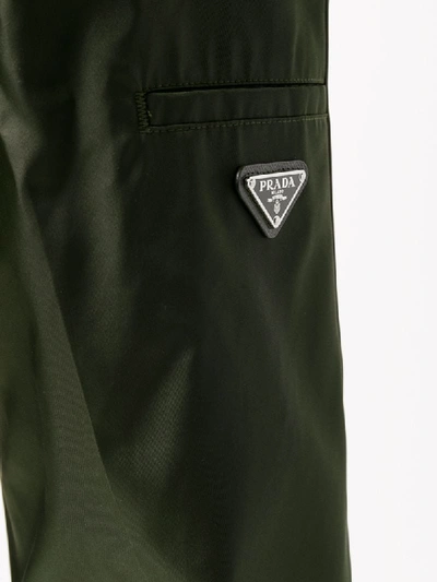 Shop Prada Hose Mit Logo-schild In Green