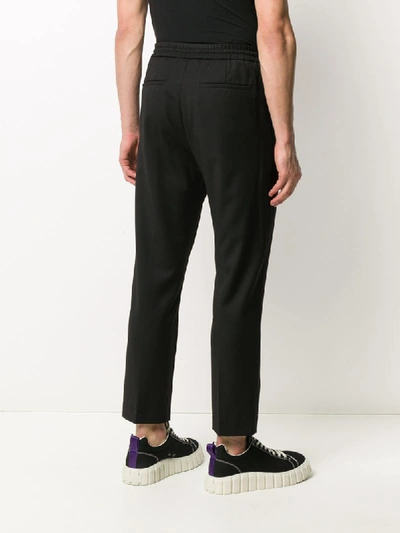 Shop Cmmn Swdn Straight Leg Trousers In Black