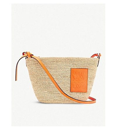 Shop Loewe X Paula's Pochette Raffia And Leather Basket Bag In Natural/neon Orange