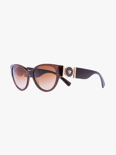 Shop Versace Brown Medusa Medallion Cat Eye Sunglasses In 530813 Transparent Brown Brown Gradient