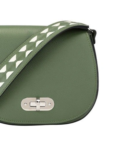 Shop Serapian Handbags In Green