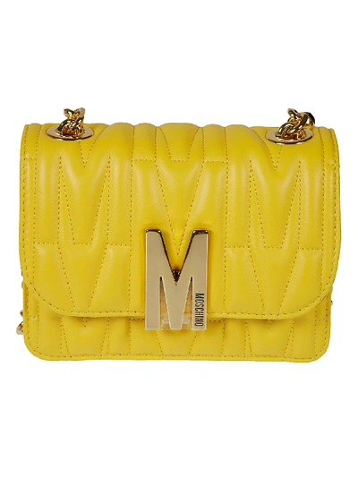 Shop Moschino Logo Plaque Quilted Shoulder Bag In Yellow