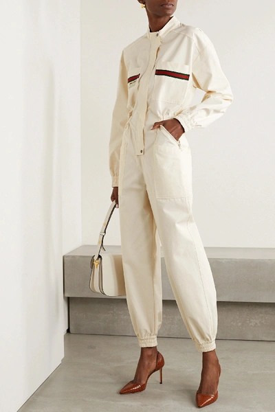 Shop Gucci Appliquéd Grosgrain-trimmed Cotton Jumpsuit In Ivory